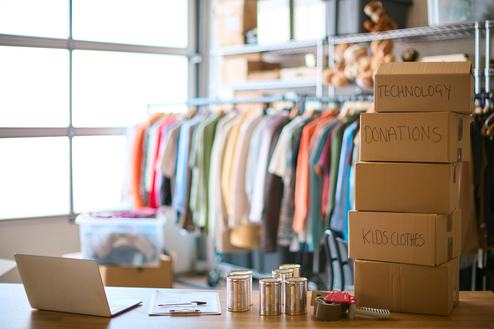 Donations Of Food Or Clothing Ready For Distribution At Foodbank Or Thrift Store